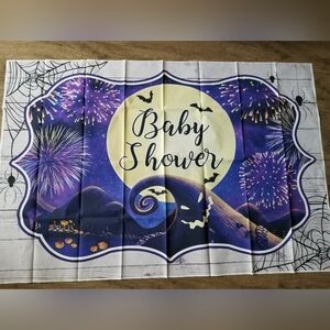 Halloween themed baby shower backdrop.